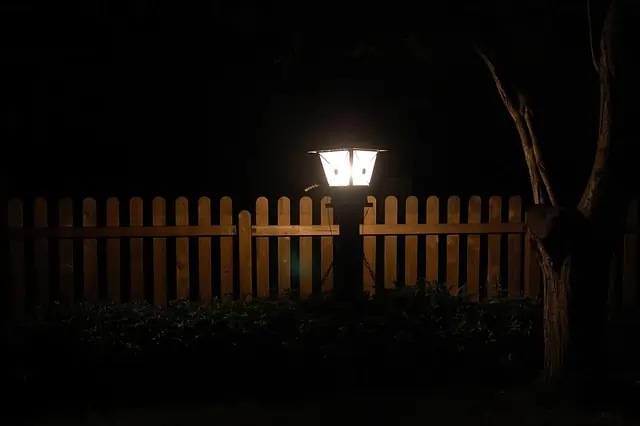 Solar garden lights enhancing the beauty of raised beds at night